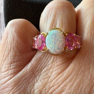 Elegant Gold and Pink Gemstone Ring with Opal Center